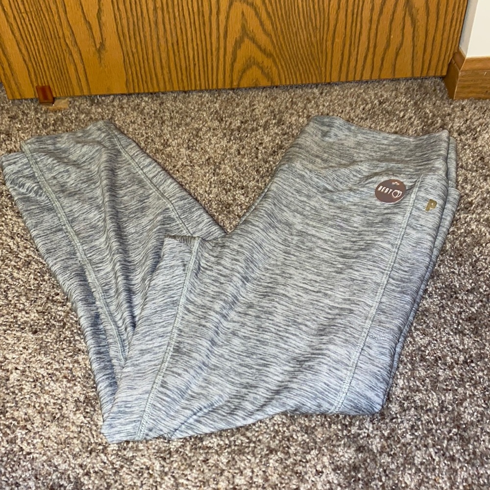 NWOT PINK Ultimate leggings size Large.